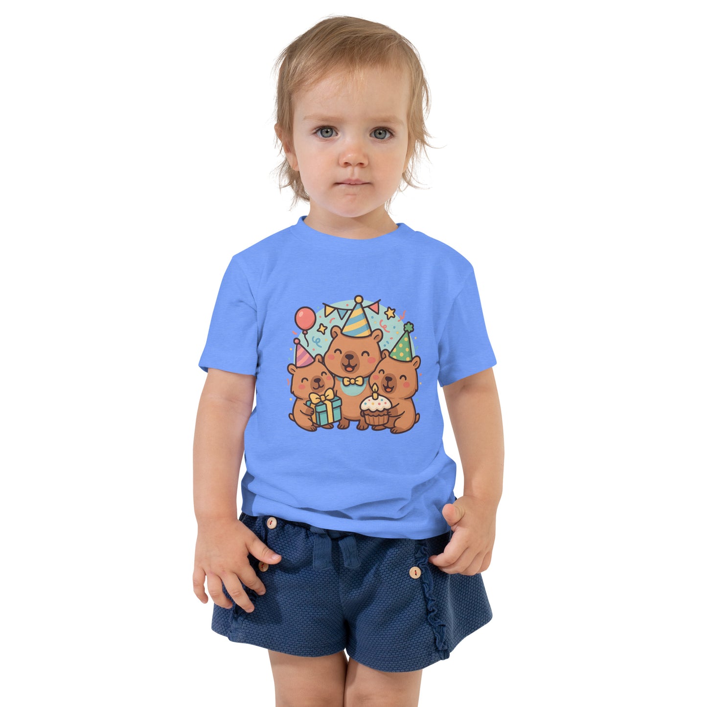 Close-up of adorable Capybara Birthday Party design with cake and balloons on a child's t-shirt