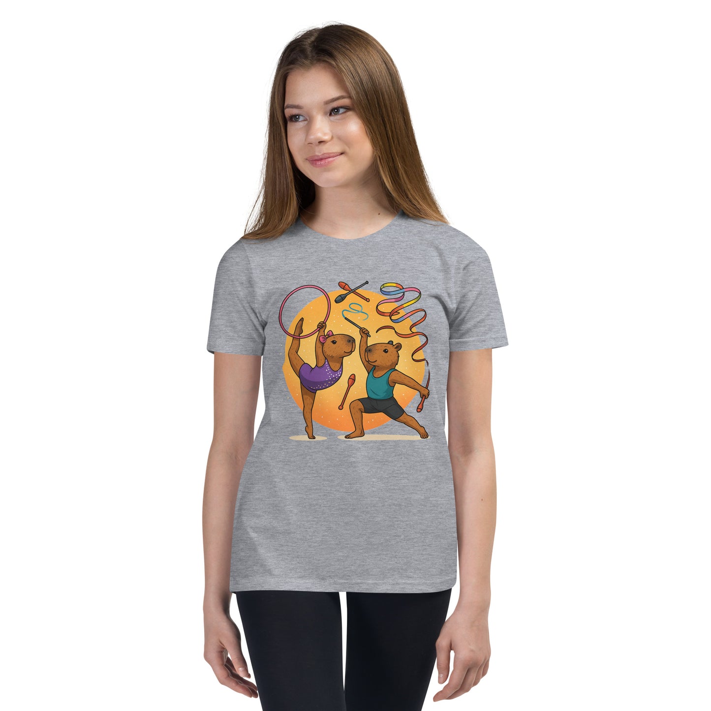 Cartoon Male and Female Capybaras Performing Rhythmic Gymnastics with Ribbons Teen T-Shirt front view, soft cotton youth tee