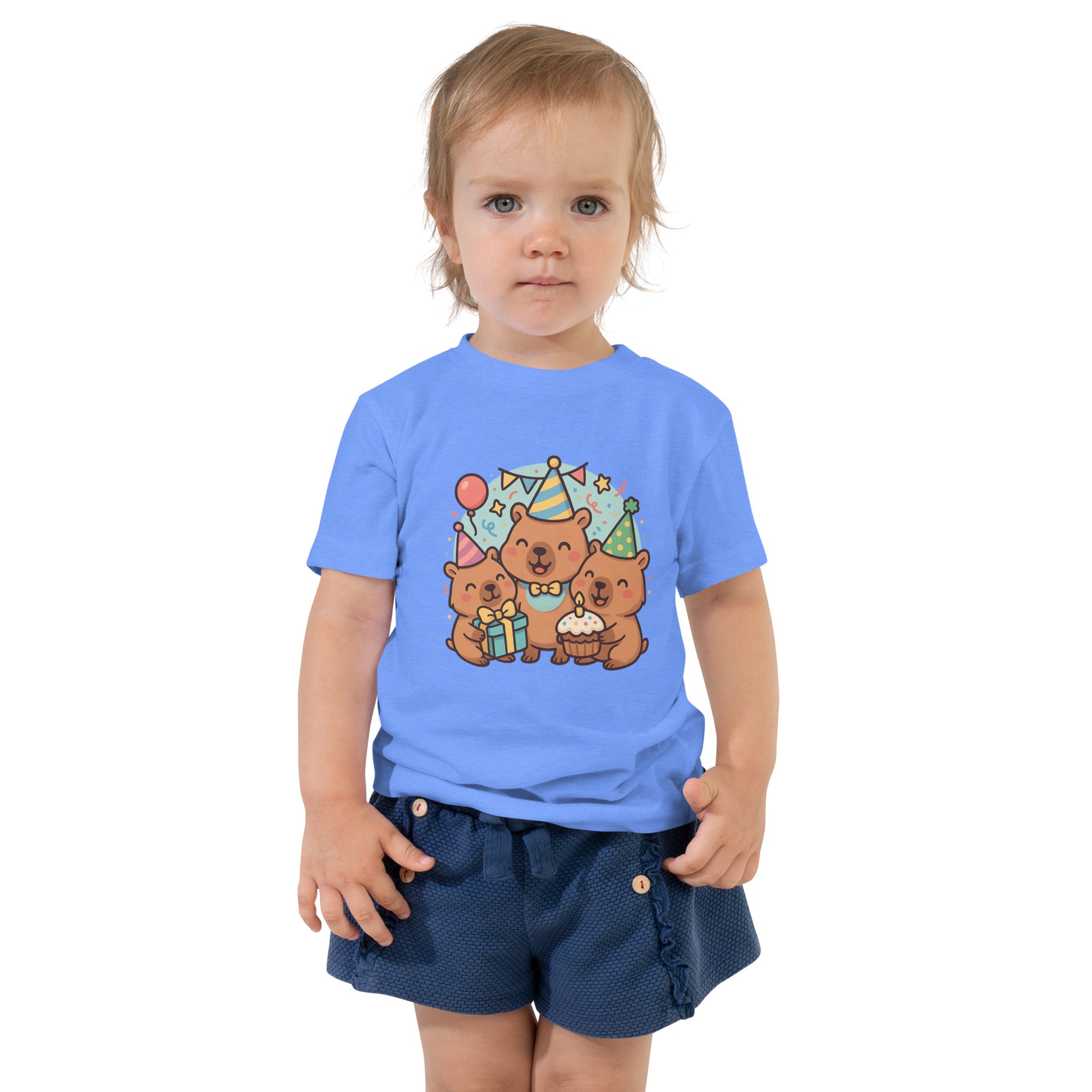 Close-up of adorable Capybara Birthday Party design with cake and balloons on a child's t-shirt