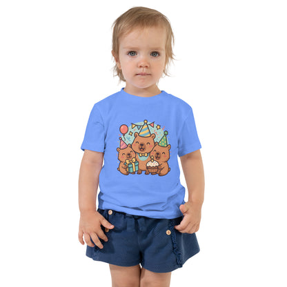 Close-up of adorable Capybara Birthday Party design with cake and balloons on a child's t-shirt