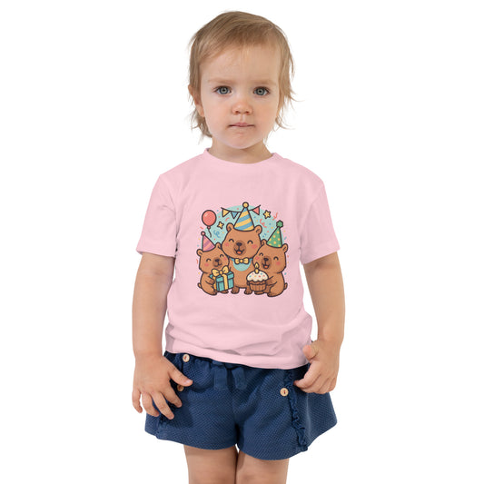 Close-up of adorable Capybara Birthday Party design with cake and balloons on a child's t-shirt
