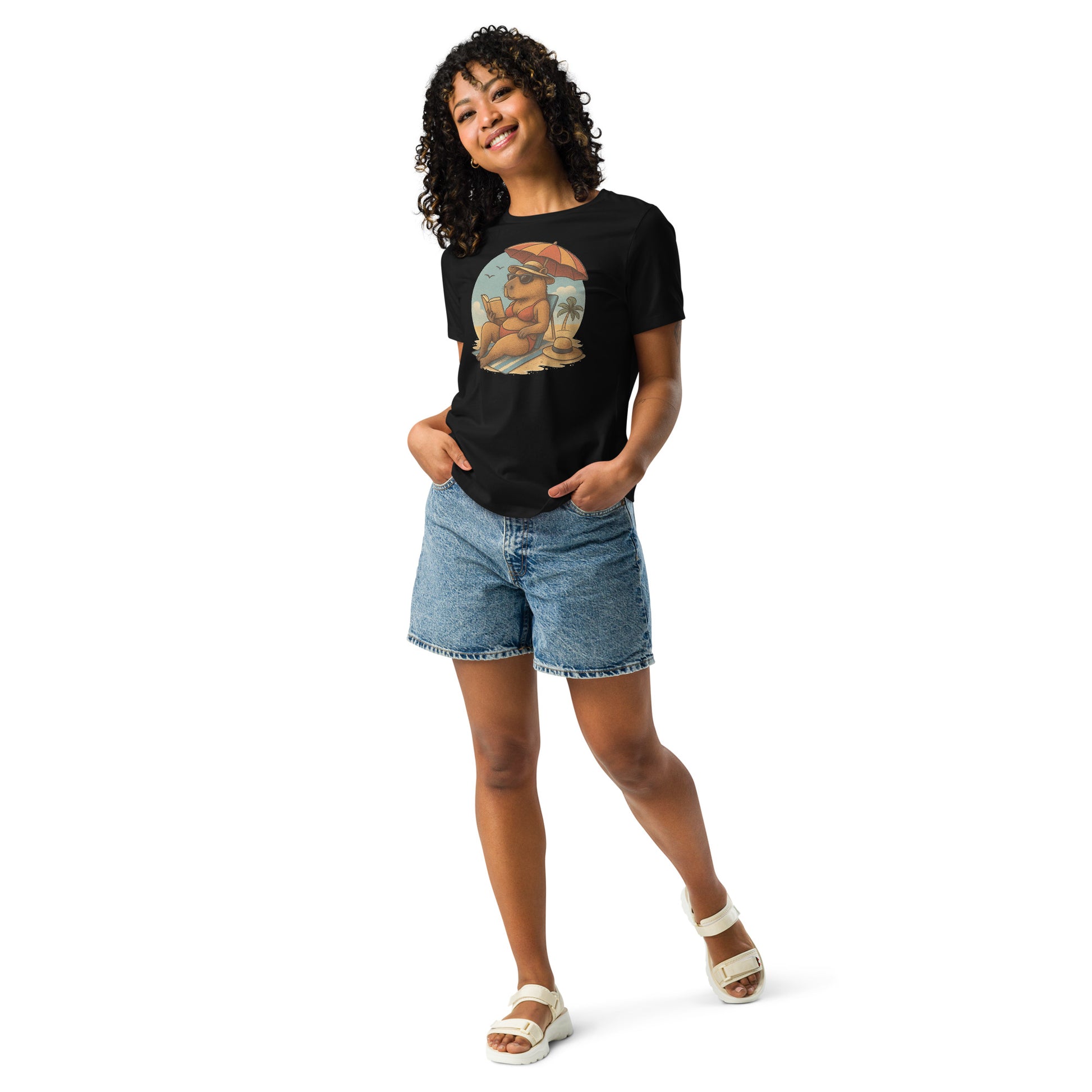 Cartoon Woman Capybara laying on beach in bikini reading book under umbrella Women's T-Shirt front view